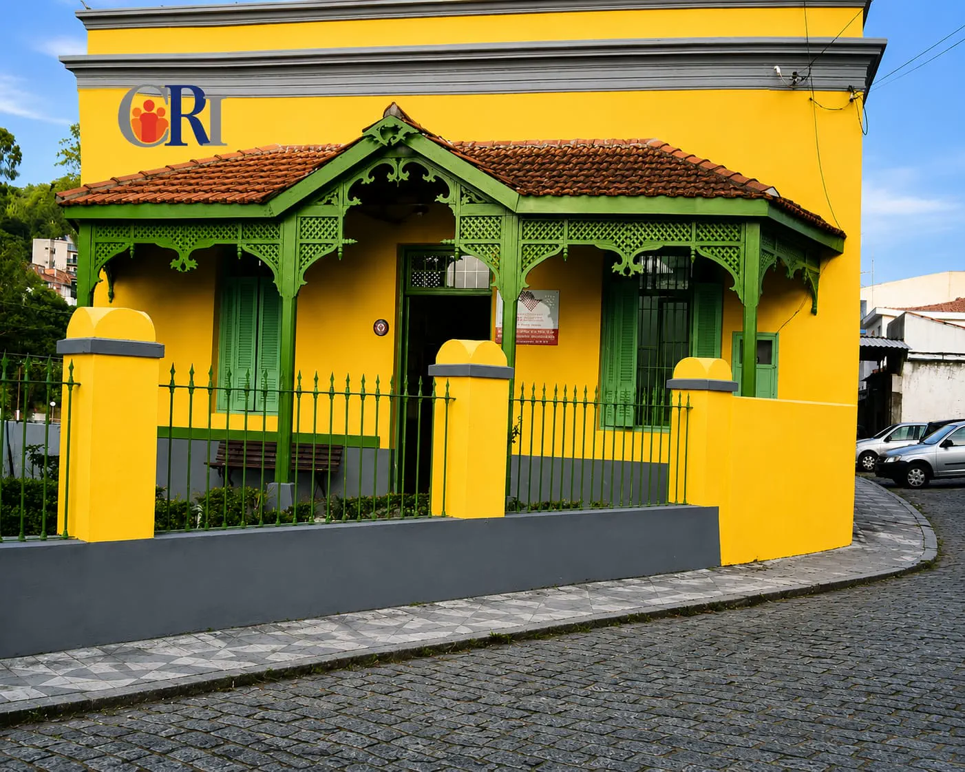 Fachada amarela e verde da sede do CRI em Ribeirão Pires
